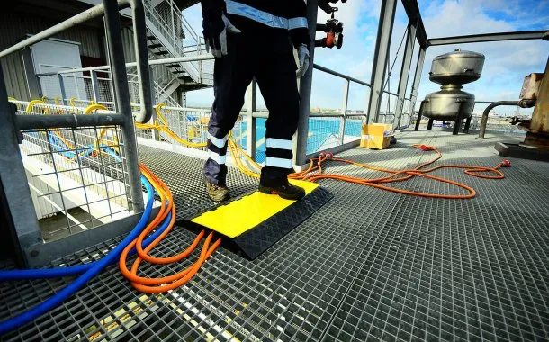 Lightweight polyurethane cable guards for heavy duty hazard prevention